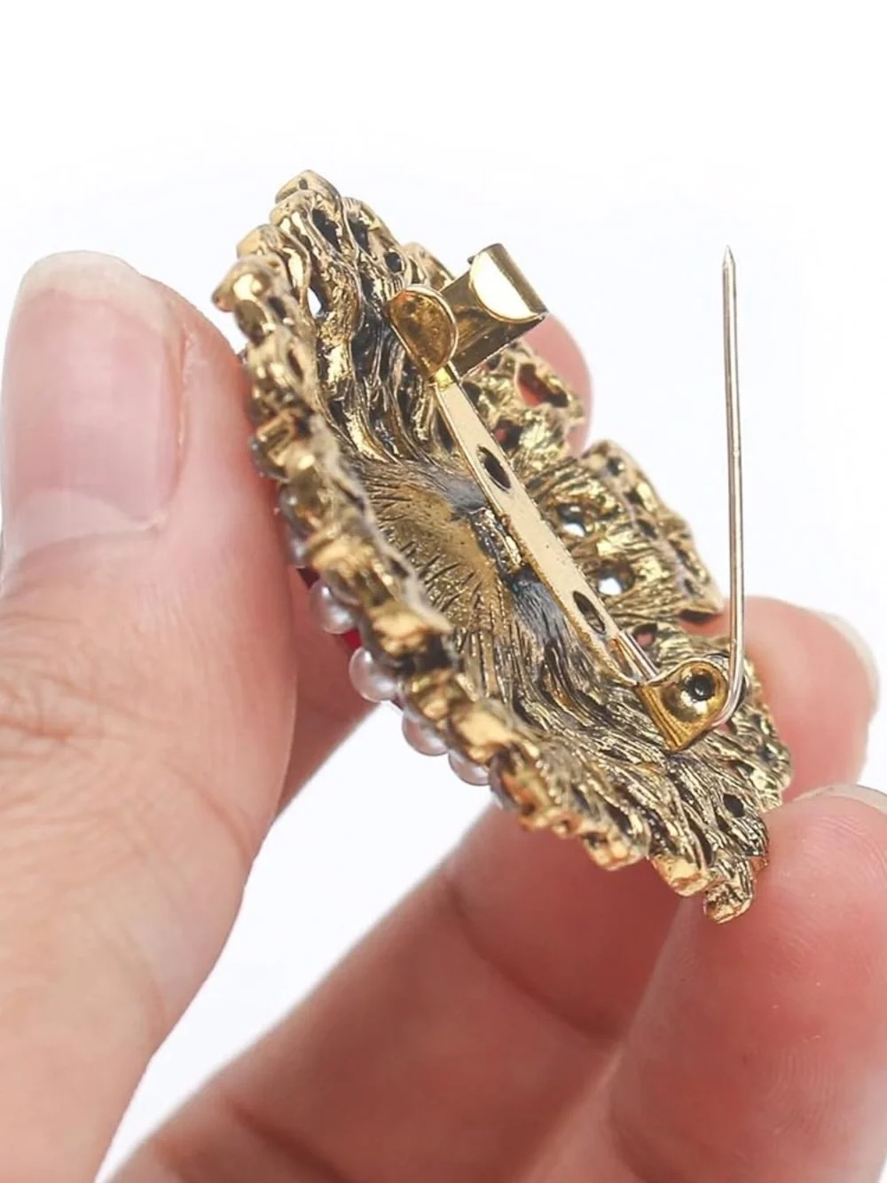 Anthropologie ornate gold